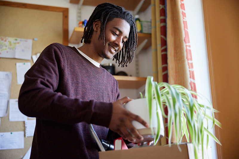 Man holding plant
