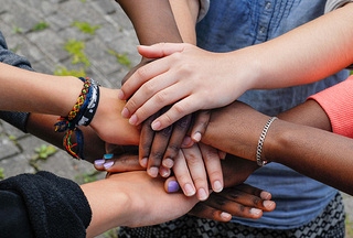 5 Ways to Show Love and Support to Your Loved Ones During the Month of Love -  people crossing hands